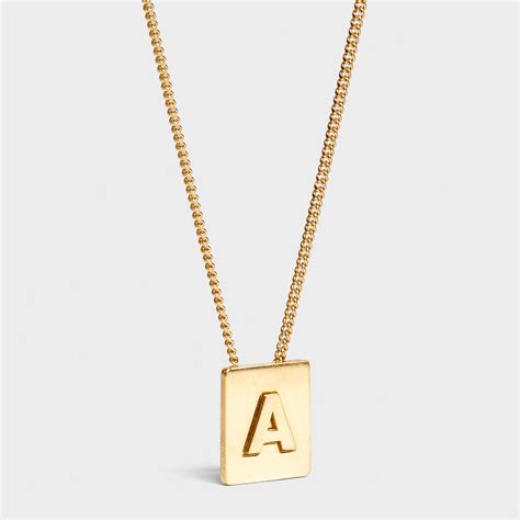 celine lock necklace|Celine necklace alphabet.